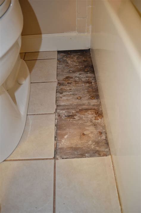 how to fix a bathroom floor tile
